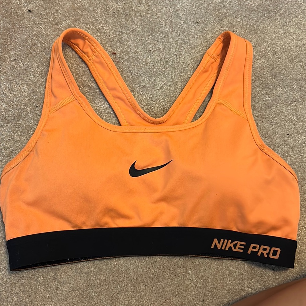 Orange Nike sports bra